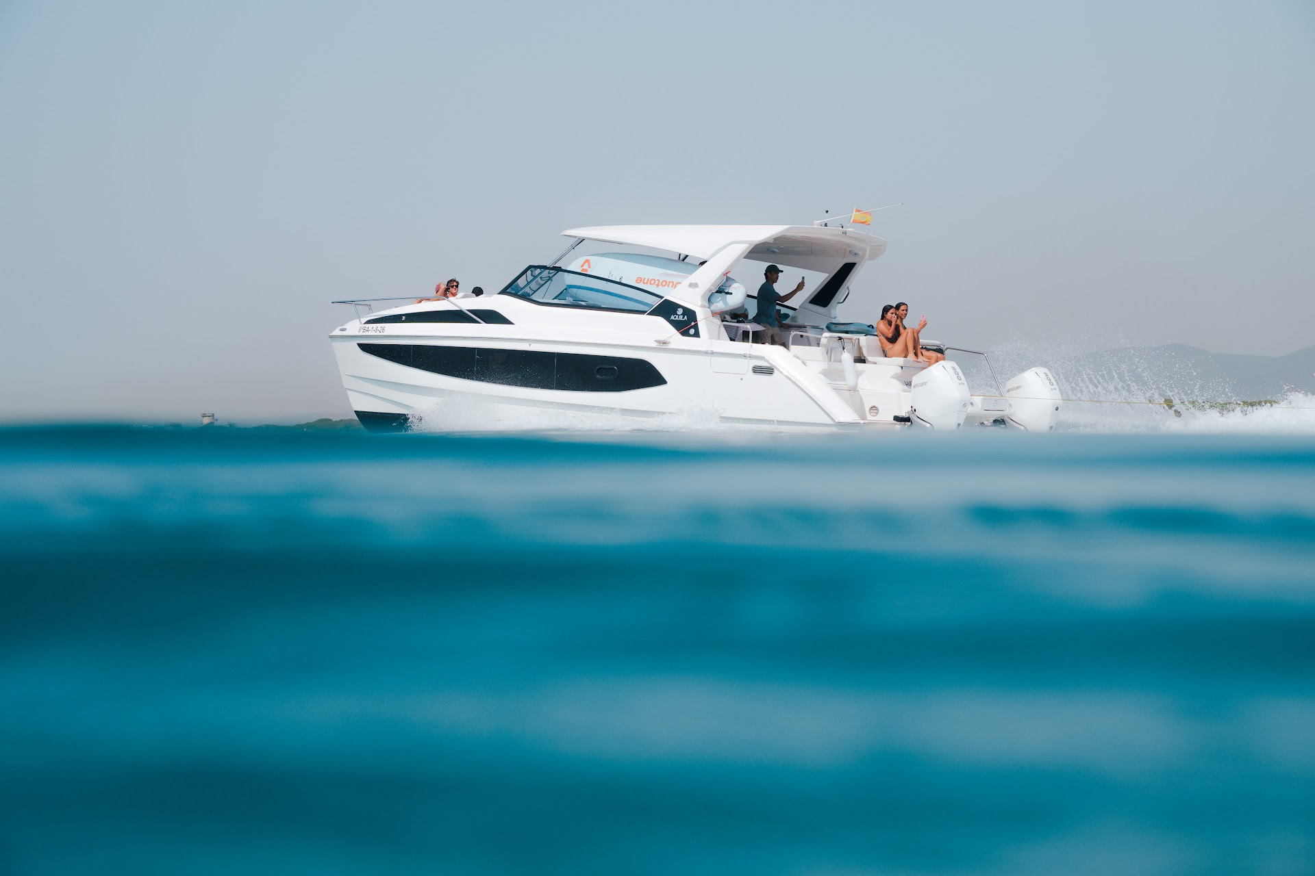 Aquila 36 power catamaran cruising the Barcelona coast